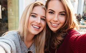 Two smiling women taking a selfie