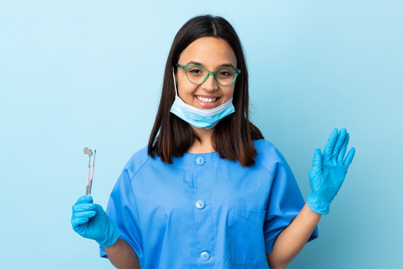 Hygienist smiling at dentist in Merrimack